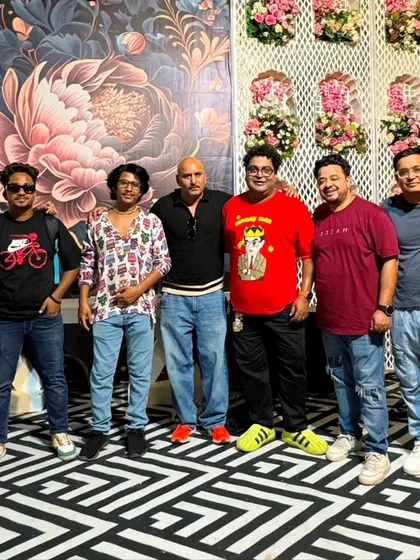 A behind the scenes moment with the entire entertainment team. We work together seamlessly to ensure every aspect of the show, from music to performance, is perfectly executed.