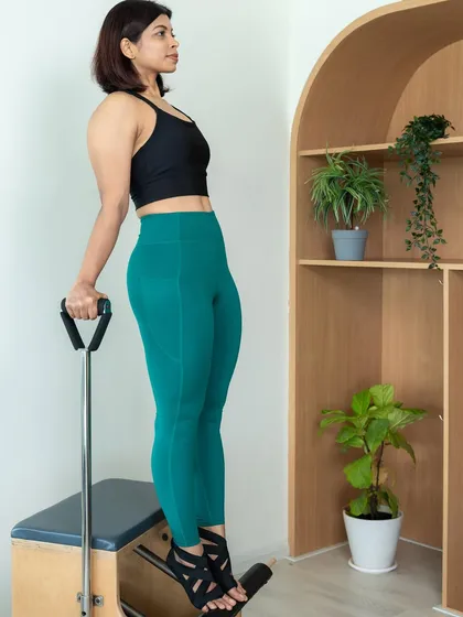 Mind-body connection, core strength, and core stability are more than just buzzwords here. This exercise on the chair requires all three.
