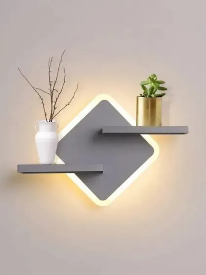 This modern wall sconce doubles as a small shelf, a perfect example of our belief in combining style and function.