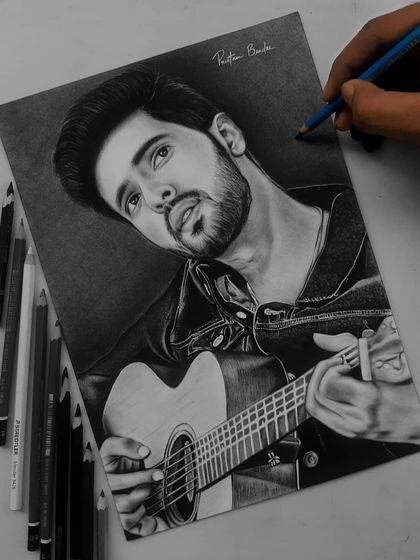 Follow the 90-hour journey of my Armaan Malik portrait. These progress shots show how I use the grid method to ensure accuracy and build up the face, hair, and clothing textures.