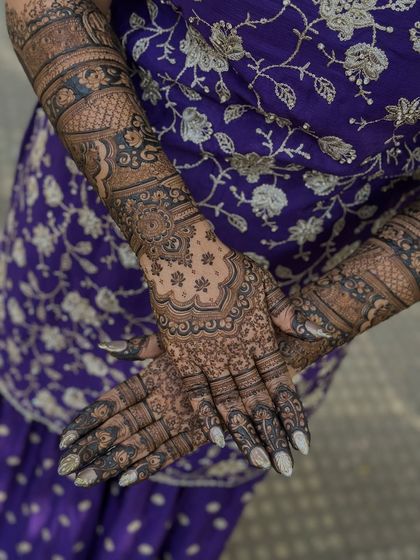 Another angle showcasing the dense and detailed work involved in a full coverage custom bridal mehendi.