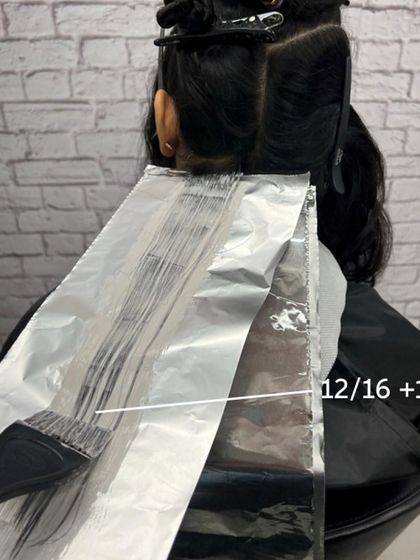 Applying the highlights with Koleston Perfect special blondes. This is a great technique for brunettes who want to go lighter without harsh bleaching.