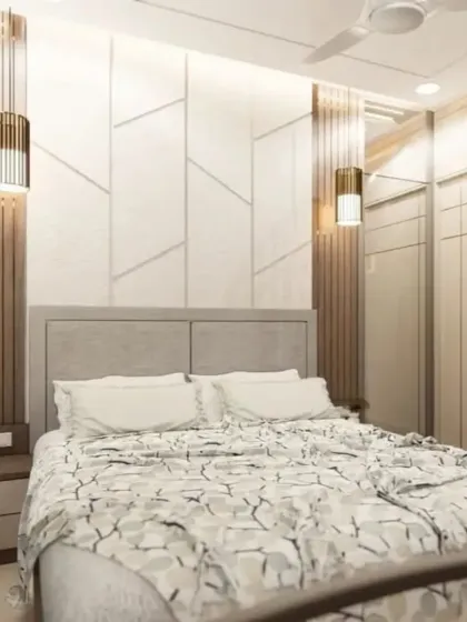 A bedroom with a geometric-paneled accent wall and stylish pendant lights. The neutral color scheme and clean lines create a modern and restful space.