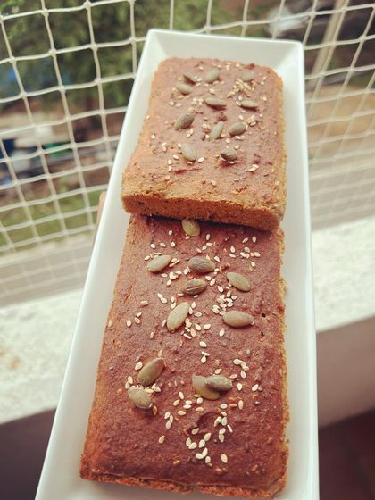 My protein-rich lentil bread cooling by the window. It's completely free from dairy, soda, and preservatives, making it a great choice for kids' snacks and health-conscious adults.