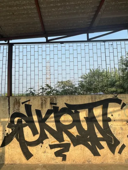 One can, one wall. A simple, bold Devnagri tag. Sometimes that's all you need to make a statement. Raw and unfiltered.