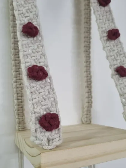 A closer look at the rose embellishments on the wall shelf. These tiny, knotted flowers are a detail I love adding to make a piece extra special.