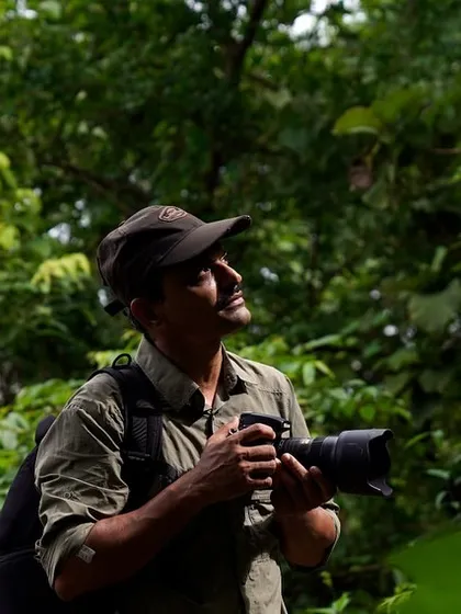 In the field, patience is my most important tool. Here, I am immersed in the forest, camera in hand, waiting for the right moment to capture a part of a larger story. My photography is a slow, deliberate process of observation and documentation.