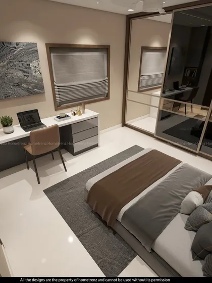 This guest bedroom design includes a compact study area and a full-wall mirrored wardrobe, making the room feel larger and brighter.