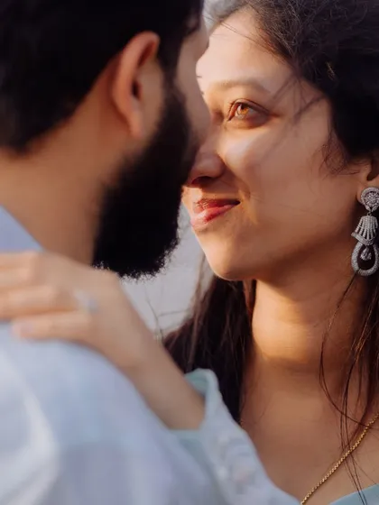 A beautiful close-up capturing a playful, intimate moment between the couple. I focus on genuine expressions that show their unique bond.