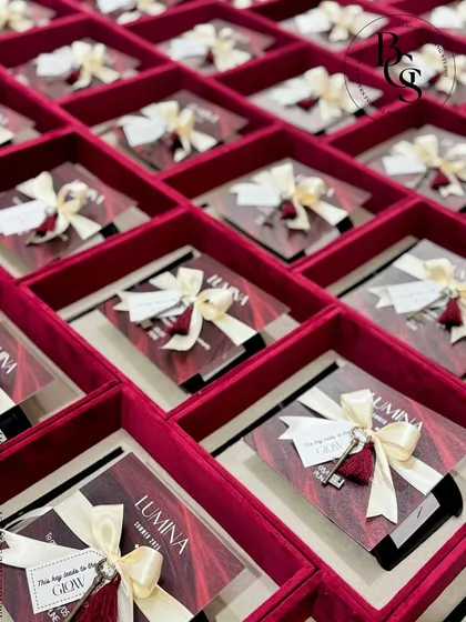 The invitation for the 'LUMINA' event, complete with a vintage key, was the centerpiece of these custom suede gift boxes. This shows my attention to thematic details that make an invite hamper truly memorable.