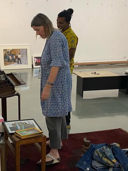 The artist and team sorting through the many objects and artworks for the 'Southern Stars' show.