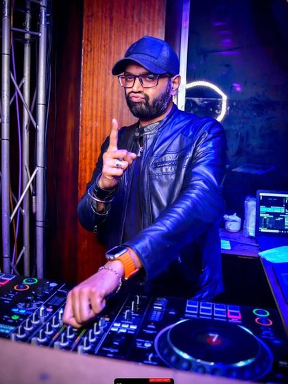 There are levels to this. A shot of me at the console, focused on delivering the perfect mix.