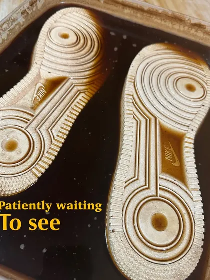 Patiently waiting for the magic to happen. The soles of the Air Force 1s soaking in the coffee bath.