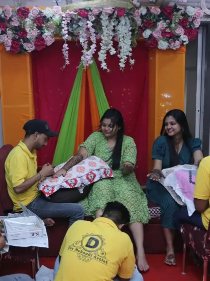 A candid shot from a home bridal mehndi session. We create a festive and comfortable atmosphere for the bride-to-be.