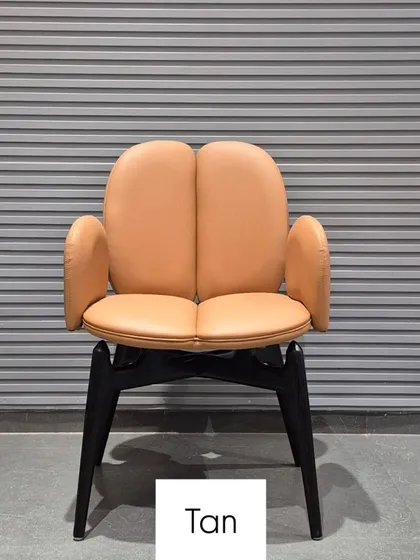 This imported chair, shown in Tan, features a unique backrest and arm design. As wholesalers, we provide these high-end chairs for homes, offices, hotels, and restaurants.