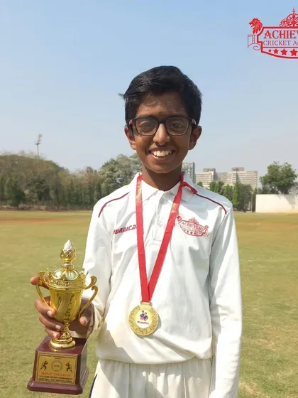 Shaunak Gawade, named 'Man of the Finals', holding his trophy after a match-winning performance in the ASMC U-12 tournament.