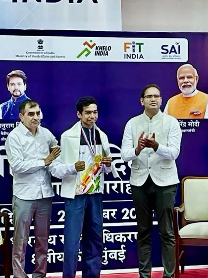 Siddhesh Pawase being felicitated by officials at the Sports Authority of India event.