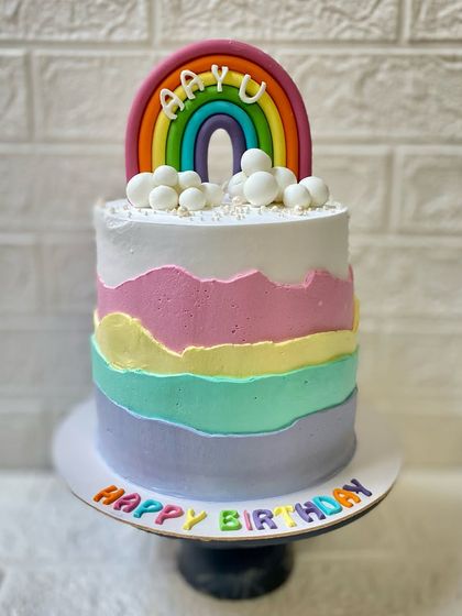 Colours of celebration. This vibrant pineapple rainbow cake is sure to bring a smile to anyone's face.