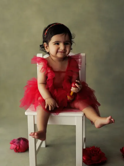 A heart-melting smile. Capturing these moments of pure, uninhibited joy is what makes my job so rewarding.
