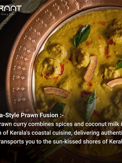 My Kerala-style prawn curry combines spices and coconut milk in a fusion of coastal cuisine, delivering authentic flavor.