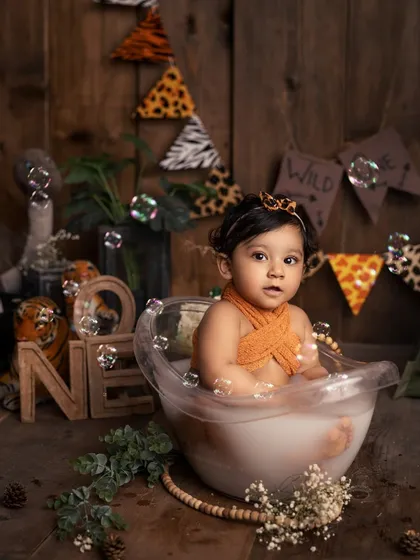 A thoughtful moment amidst the bubbles. Even in a playful bath session, I capture those quiet, beautiful expressions that show a different side of your baby's personality.