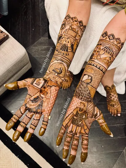 Full bridal mehendi for a Mumbai bride, complete with story elements and traditional figures. You can also see the matching intricate mehendi I did for her feet.