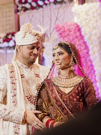 A sweet, candid moment between the bride and groom on their stage. They look so happy together.