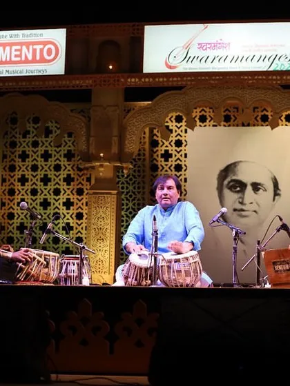A wider view of the stage at the Swaramangesh festival. You can see the beautiful setup and the portrait of the master in whose honour the festival is held. It was a truly memorable evening.