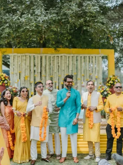 Leading the family in a group song and dance. It's moments like these that bring everyone together and create a true family vibe.