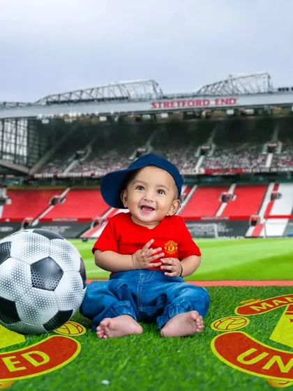 Another happy fan, this time cheering for Manchester United. These digitally enhanced backgrounds create a realistic stadium feel for your little champion.