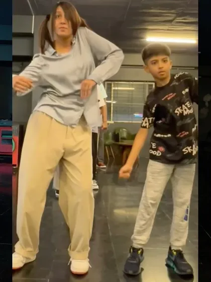Drills are the foundation of all great dancers. I make sure our training sessions are engaging and fun, so learning tough techniques feels like a treat, not a task. Here, we're working on popping drills and body control.