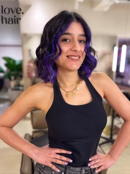 The client looking gorgeous and edgy with her new purple-kissed bob.