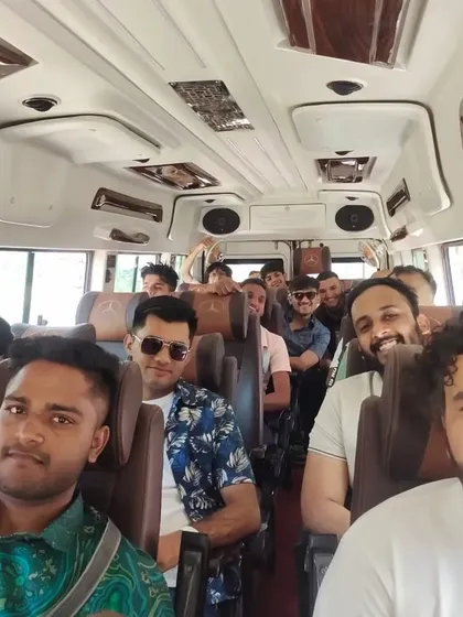 All smiles on the way to our training camp. We believe in a positive and supportive team environment.