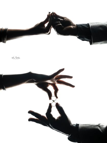 A creative collage of silhouette shots focusing on the hands and rings. These detail shots are a beautiful and symbolic way to tell the story of your commitment.
