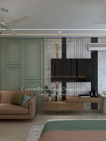 This view shows the integrated TV unit and study desk in the bridal bedroom. The use of wood tones and classic wall molding adds warmth and timeless charm.