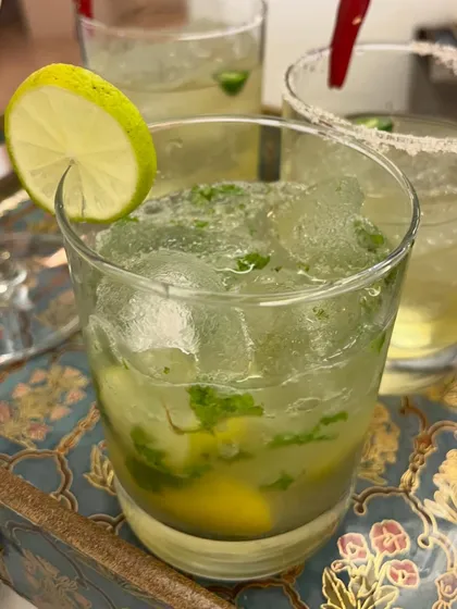 A classic Mojito, perfectly muddled with fresh mint and lime. It's a timeless favorite that we craft to perfection.