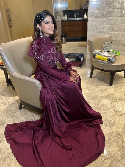A dramatic and glamorous look for an engagement bride. The long, flowing waves are paired with a side part and crystal hairpins for extra sparkle.