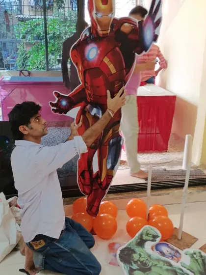Setting up the Iron Man cutout for the Avengers party. We've been working with this client in Borivali for three years straight.