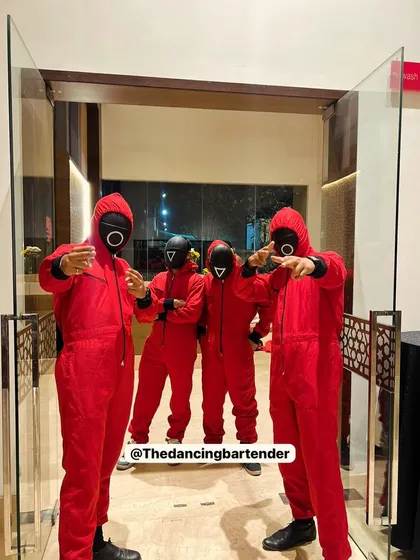 Your party's theme is my command. For this after-party, my team and I fully embraced the Squid Game concept, complete with costumes and themed shots, creating a fun and immersive experience for all the guests.