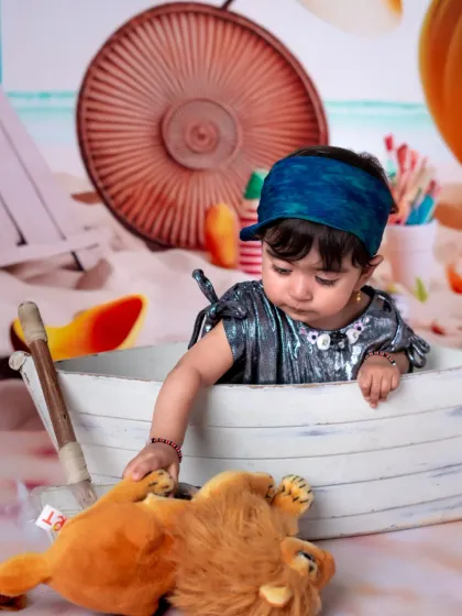 Caught a wave of cuteness. Even the toys get to play along in our themed shoots.