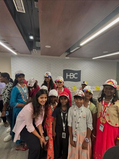Posing with the creative kids after a fun-filled cap painting session for HBC and Sneha Shraya. Their energy was infectious.