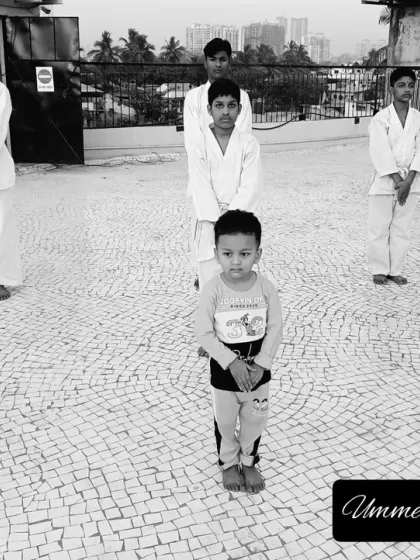 Let's begin. The class lines up, ready and disciplined, for another session of learning and hard work on our rooftop dojo. 👊🏻🥋💗