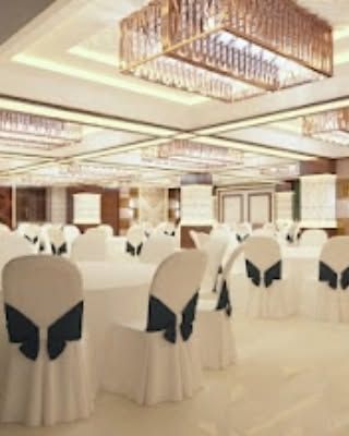 Another render of the Ashoka banquet hall, showing the elegant round table setup. All muhurat dates are currently available with special introductory offers.