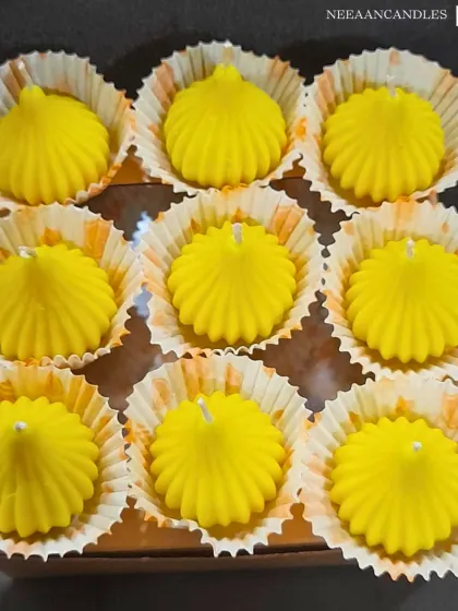 Our bright yellow Modak candles are perfect for bringing blessings and light into your home, especially during Ganesh Chaturthi. Each one is shaped like the traditional sweet offering, making it a beautiful addition to your puja or festive decor.
