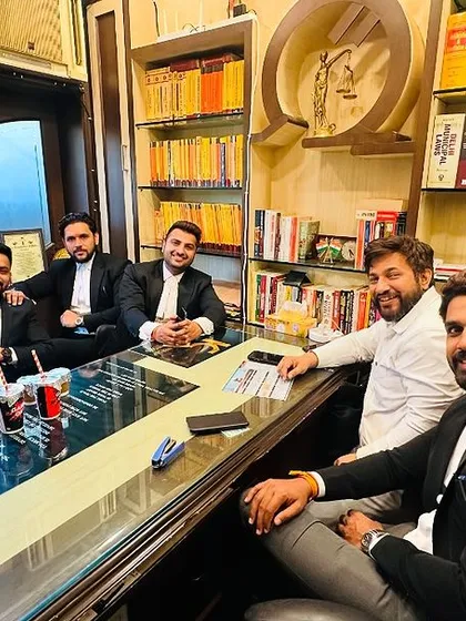 A strategy session with my team. I believe in a collaborative approach; having more brains on your side is a significant advantage when tackling complicated legal challenges for our clients.