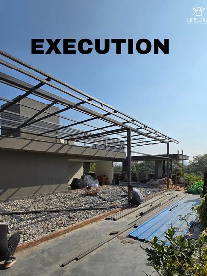 A look at the large-scale framework for a full-length terrace covering. This shows the metal structure being installed before the roofing and finishing touches are added.