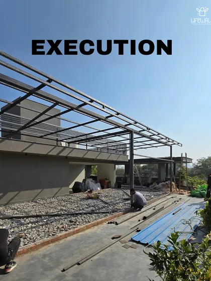 A look at the large-scale framework for a full-length terrace covering. This shows the metal structure being installed before the roofing and finishing touches are added.