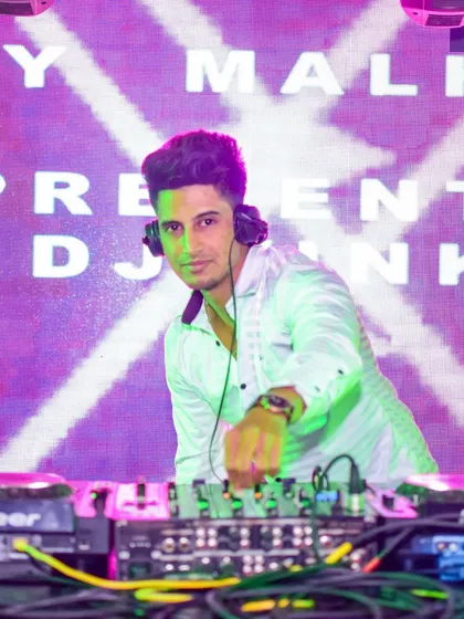 On the decks with my name in lights. I bring a professional and exciting presence to every event, backed by a library of my own exclusive remixes and mashups.