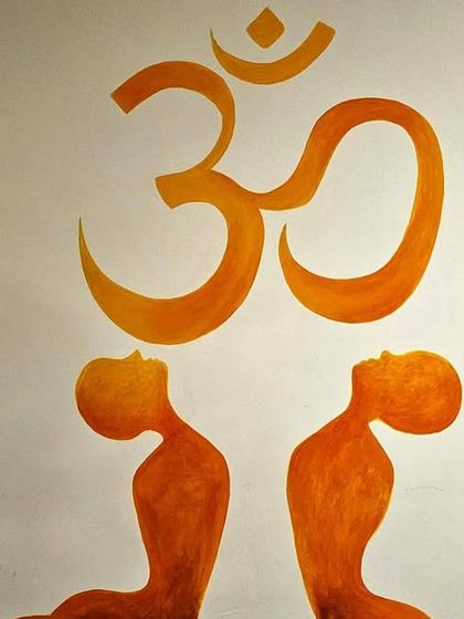 The 'Om' symbol painted on a wall.