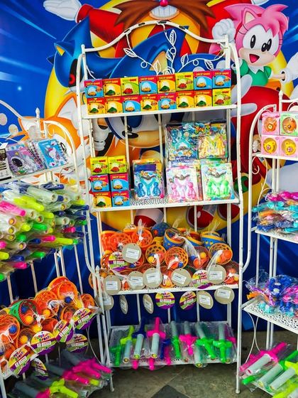 A selection of colorful and fun return gifts available for guests at the Sonic party.